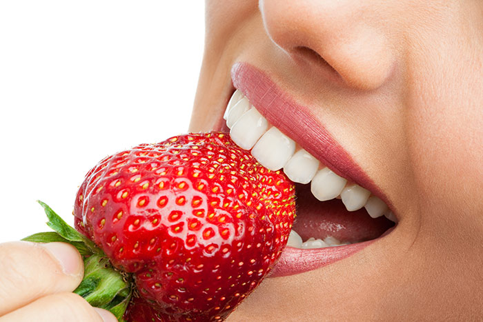 Oyster Point Dentistry - Strawberry help whitens teeth